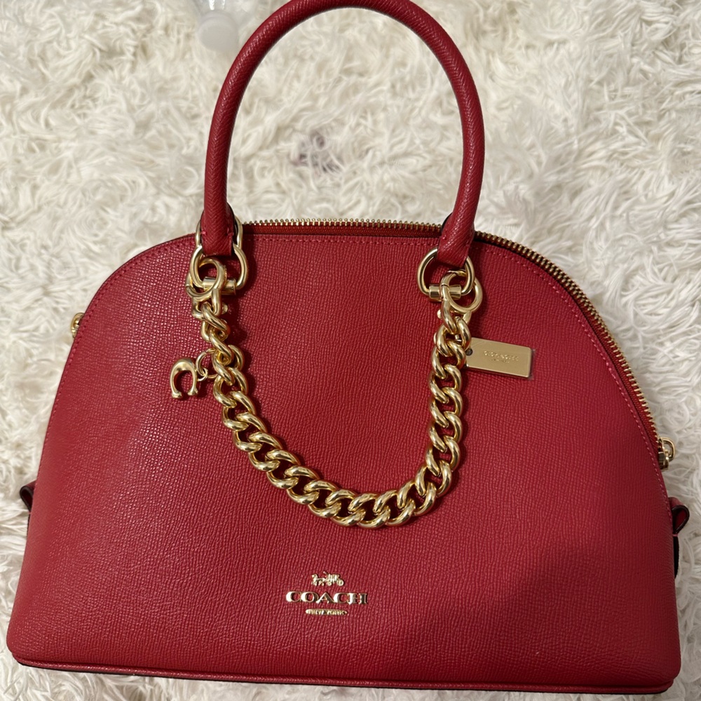 Red NEW never worn Coach bag